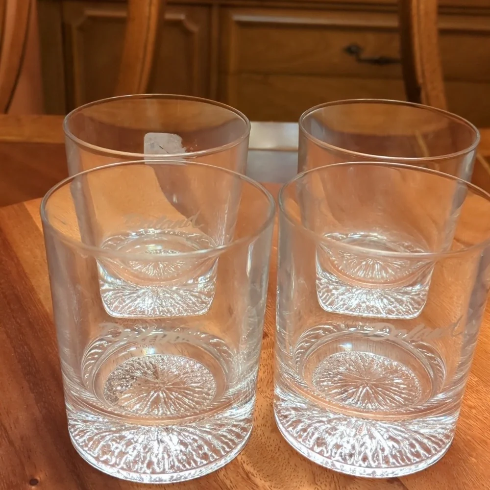 4 Whiskey glasses marked Daland